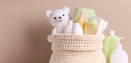 baby care supplies with a white teddy bear