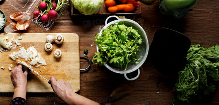 professional food prep using kitchen tools, slicing vegetables