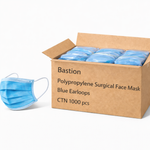 Box of Bastion polypropylene surgical face masks with a single mask in front on a white background