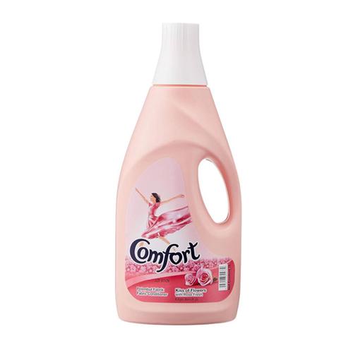 Comfort fabric softener bottle in Pink Passion scent, featuring a light pink plastic bottle with a white cap and a label depicting a dancer in a pink dress.